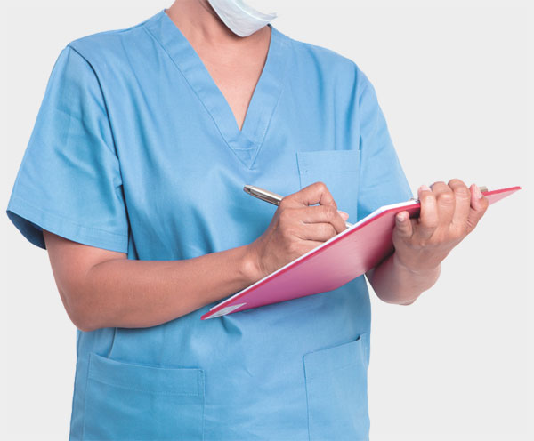 oral surgery nurse with clipboard